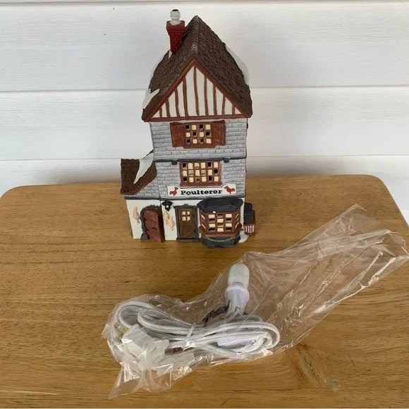 Department 56 Dickens Village "Poulterer" retired 1999 - Picture 1 of 2